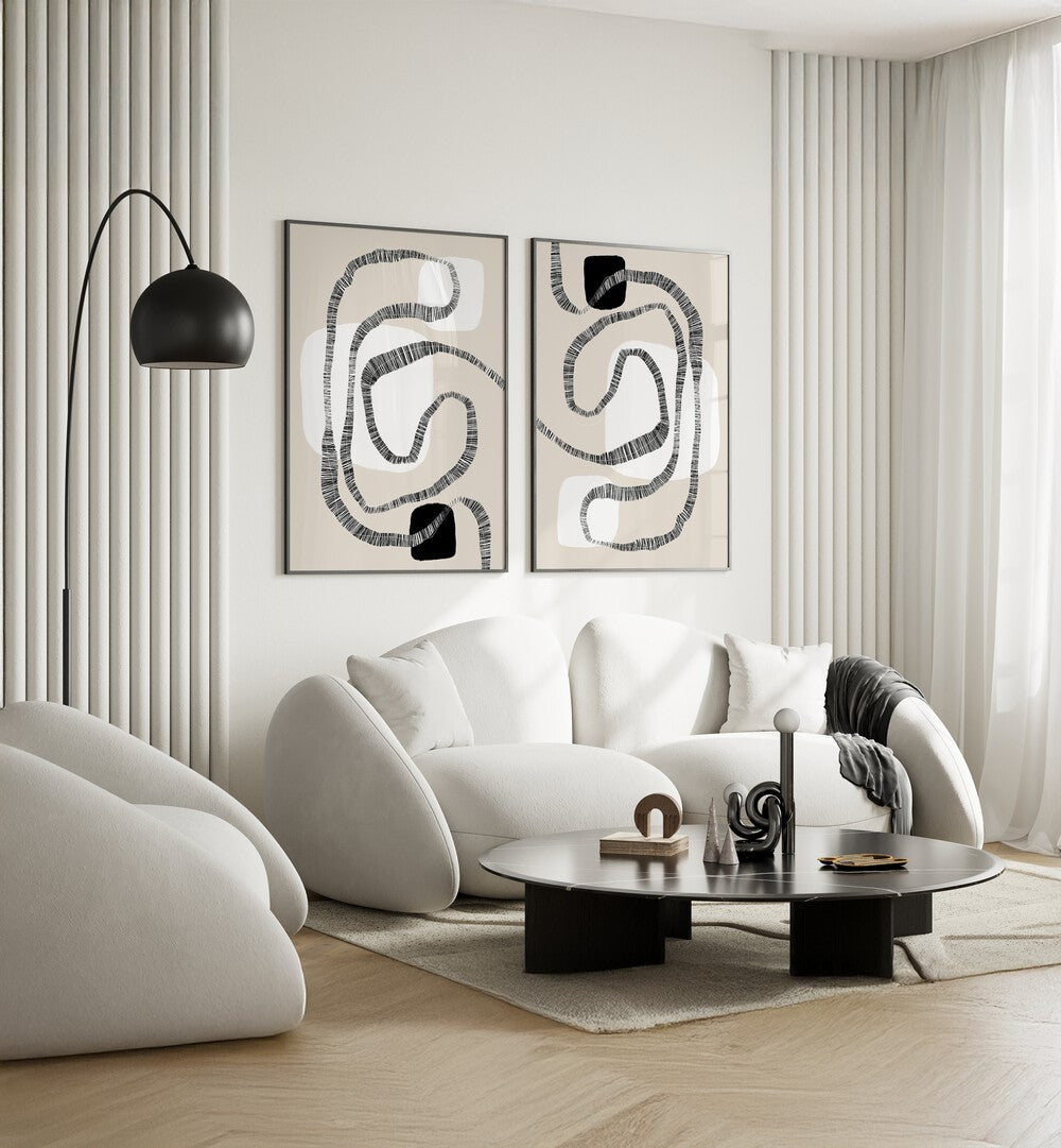 Stylishly decorate with the INTERTWINED PATHS SET, SET OF 2 PAINTINGS, enhancing any modern living space.
