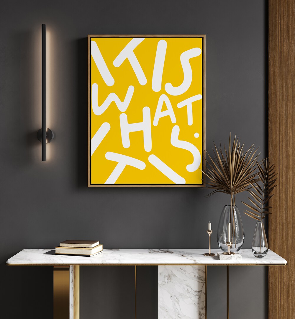 Bright yellow typography poster featuring "IT IS WHAT IT IS, QUOTES" by Uma Gokhale to inspire your living space.