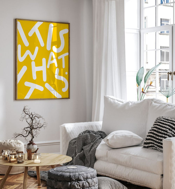 Bright yellow typography poster featuring "IT IS WHAT IT IS, QUOTES" by Uma Gokhale, perfect for inspiring decor.