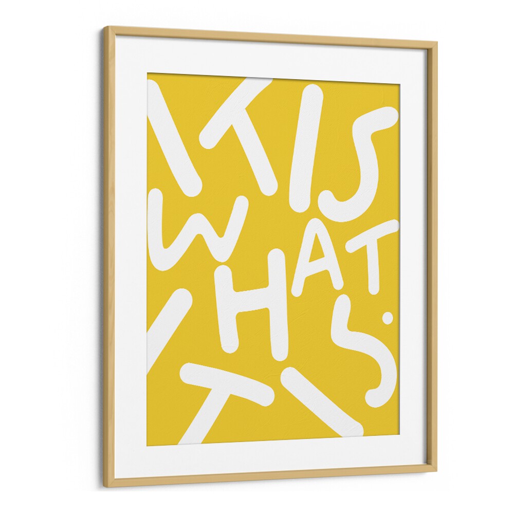 Bright yellow "It Is What It Is" typography poster by Uma Gokhale, perfect for inspiring quotes in your home decor.
