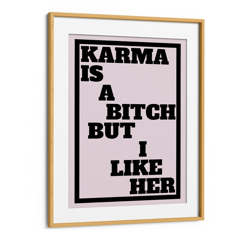 KARMA IS A BITCH BUT, QUOTES typography poster by Athene Fritsch in a stylish oak frame, perfect for bold decor.