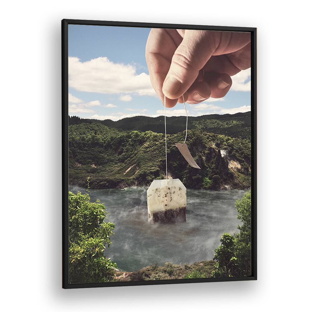 Hand holding a teabag above a serene lake, featuring LAKE AFTERNOON TEA, SURREAL ART PRINTS by Vertigo Artography.