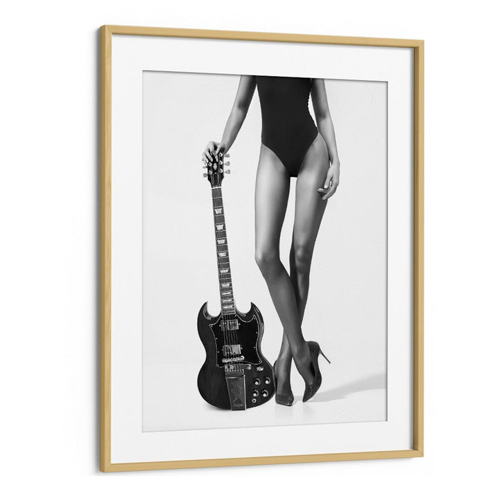 Elegant "Lady With The Gibson" photography prints featuring a striking figure and guitar, by David Drake.