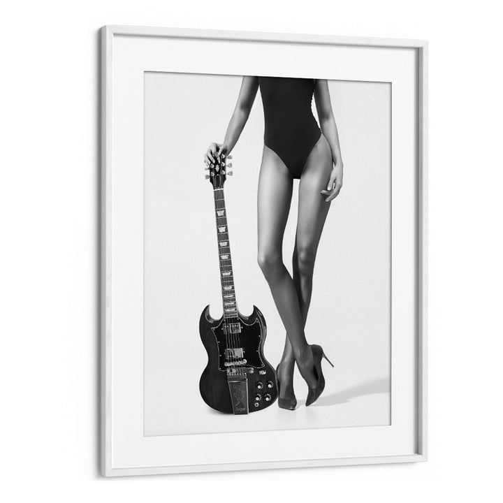 Elegant "LADY WITH THE GIBSON , PHOTOGRAPHY PRINTS" featuring a striking figure and guitar, by David Drake.