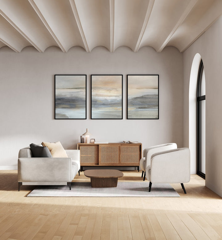 Stylish living room featuring the LANDSCAPE ABSTRACTION SET, SET OF 3 PAINTINGS by Dan Hobday for modern elegance.