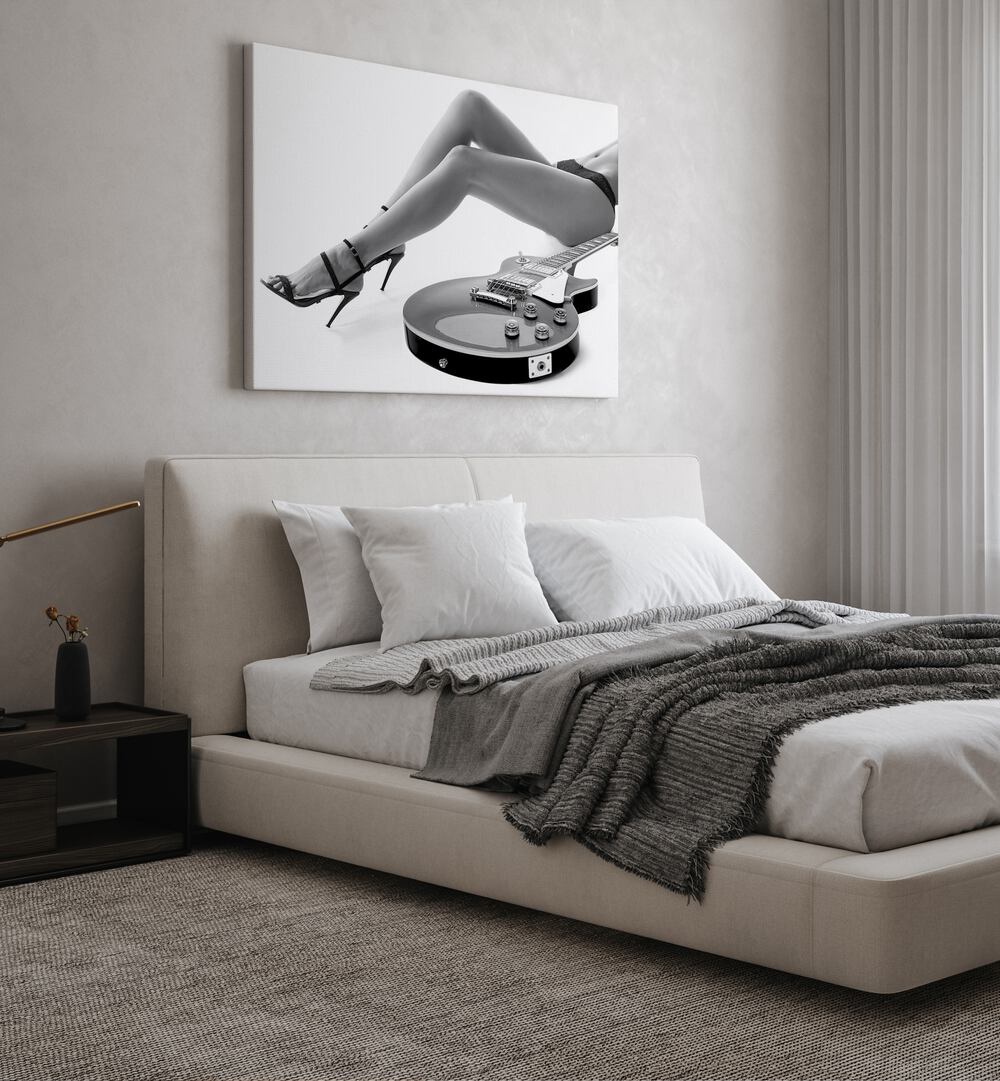 Stylish bedroom featuring LEGGY LES PAUL, PHOTOGRAPHY PRINTS by David Drake, blending art and fashion beautifully.
