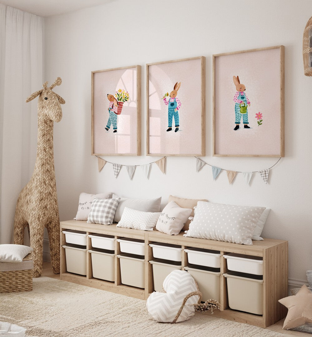 Brighten your child's room with the LITTLE GARDENERS SET, SET OF 3 PAINTINGS, featuring playful garden scenes.