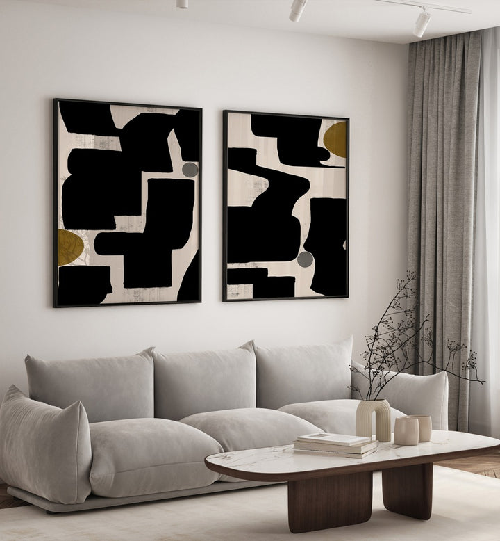 Stylish living room featuring the MONOCHROME RHYTHM SET, SET OF 2 PAINTINGS, enhancing modern decor with elegance.