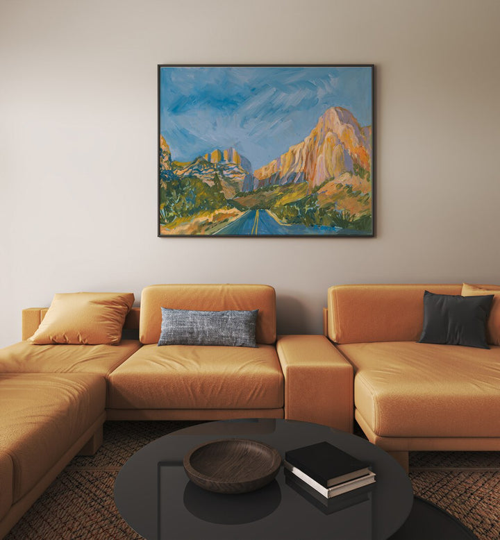 Stunning MOUNTAIN ROAD, LANDSCAPE PAINTINGS enhancing a cozy living room with breathtaking mountain scenery.