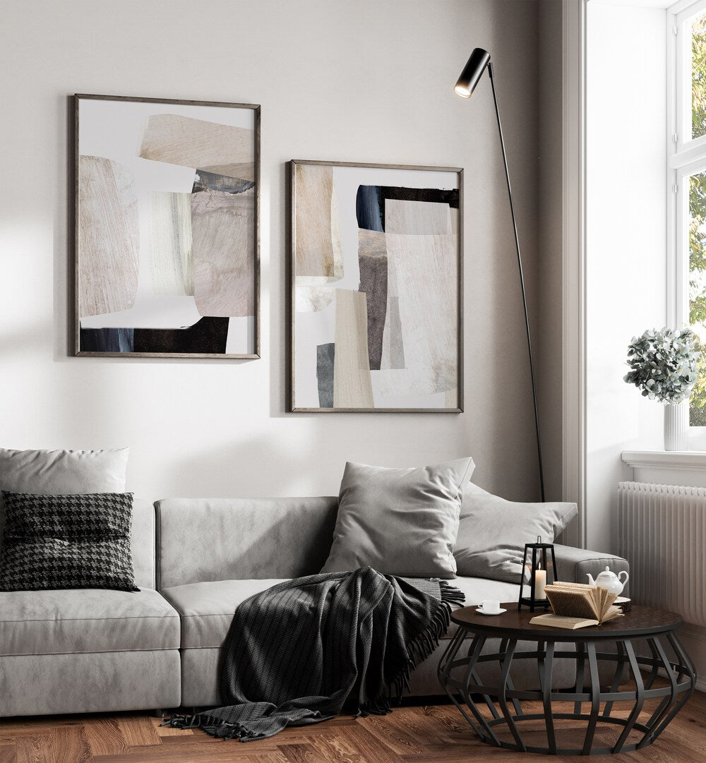 Stylish living room featuring the MINIMAL MOOD SET, SET OF 2 PAINTINGS enhancing modern minimalist decor.