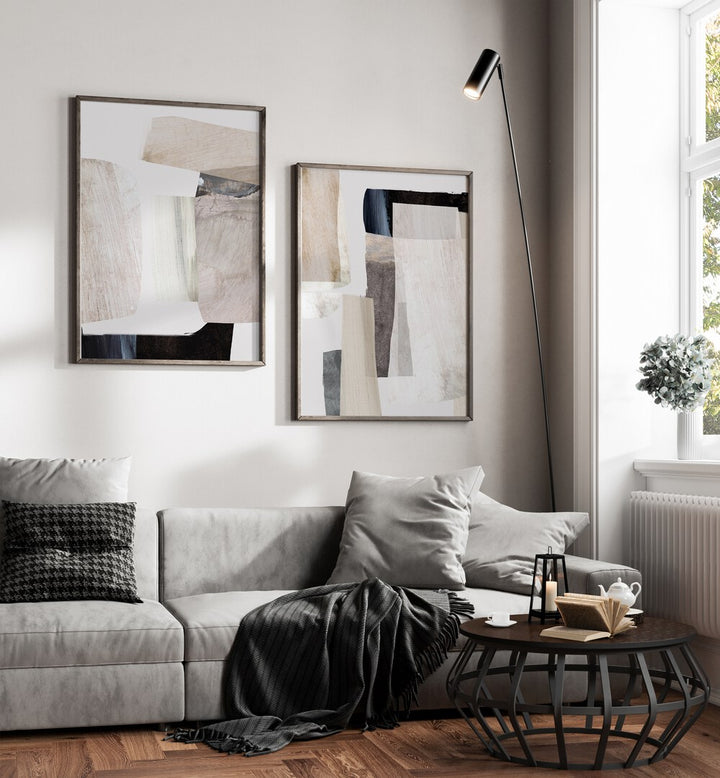 Stylish living room featuring the MINIMAL MOOD SET, SET OF 2 PAINTINGS enhancing modern minimalist decor.