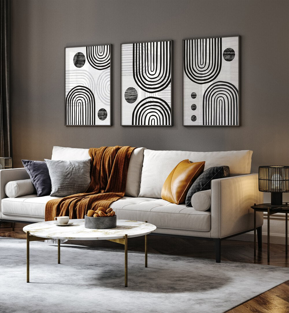Transform your space with the NOIR BOHO FORMS SET, SET OF 3 PAINTINGS, featuring chic black and white designs.