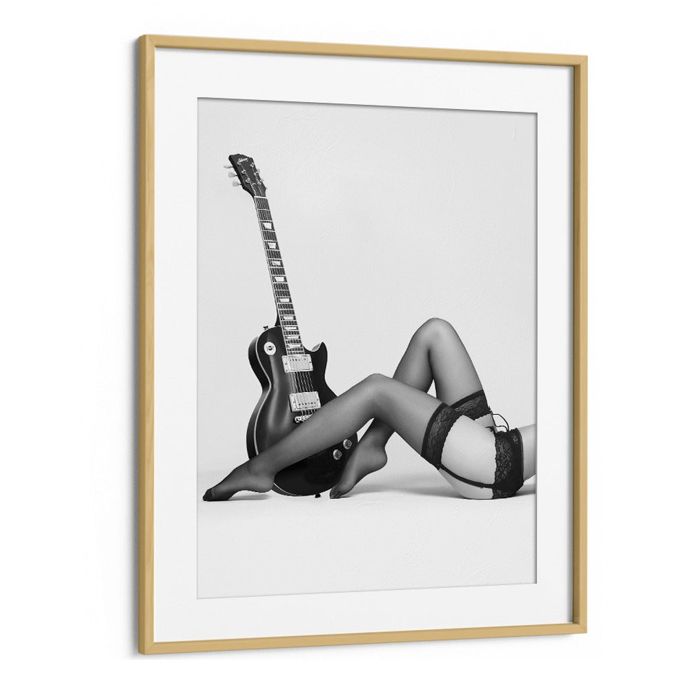 Elegant black-and-white fashion art featuring legs and a guitar, part of NOIR THE FUTURE, PHOTOGRAPHY PRINTS by David Drake.