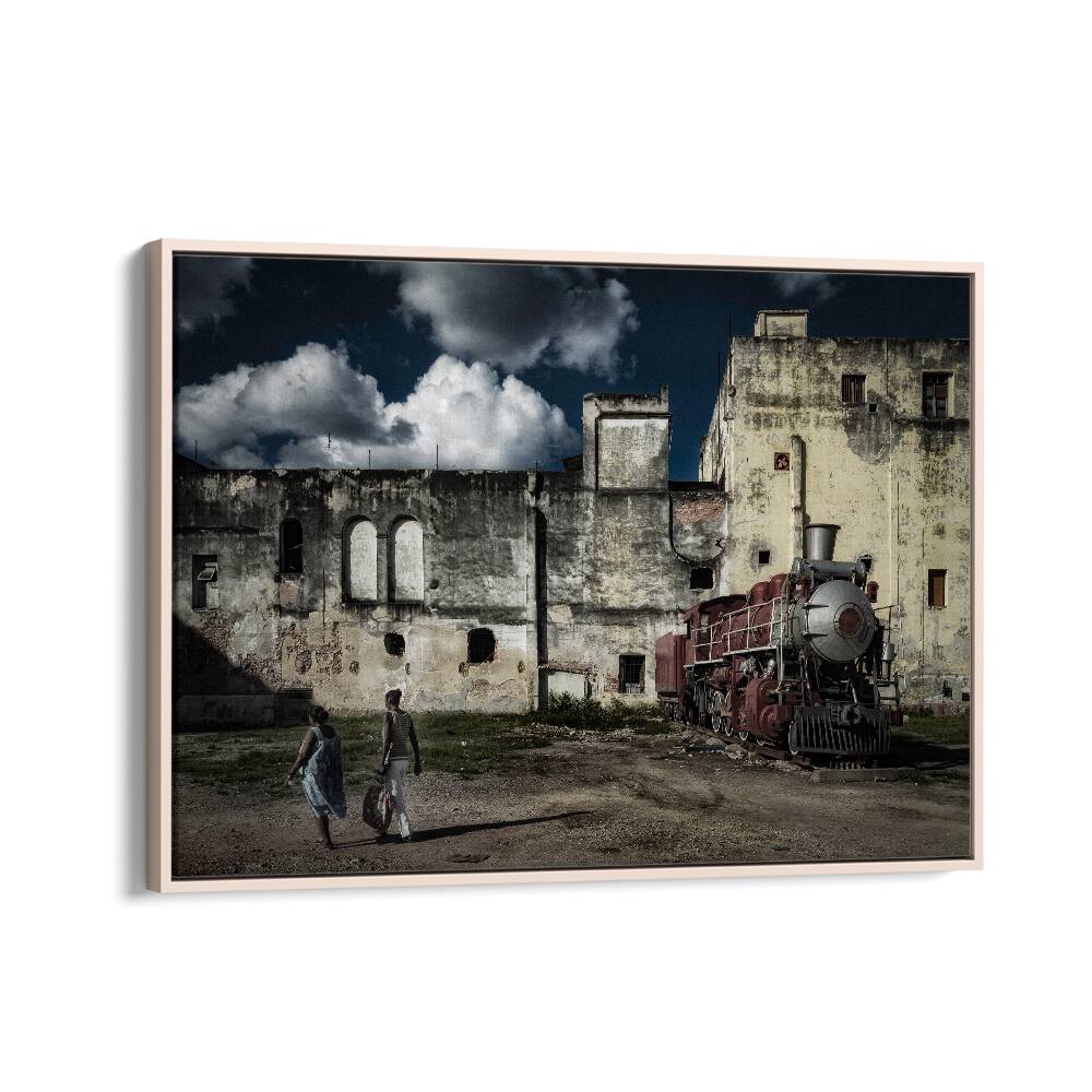 Explore urban Havana with the HAVANA TRAIN, PHOTOGRAPHY PRINTS showcasing a vintage train against historic architecture.