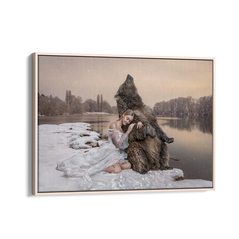 CUDDLING BEAR, PHOTOGRAPHY PRINTS showcase surreal artistry with a bear and a woman in a dreamy winter landscape.