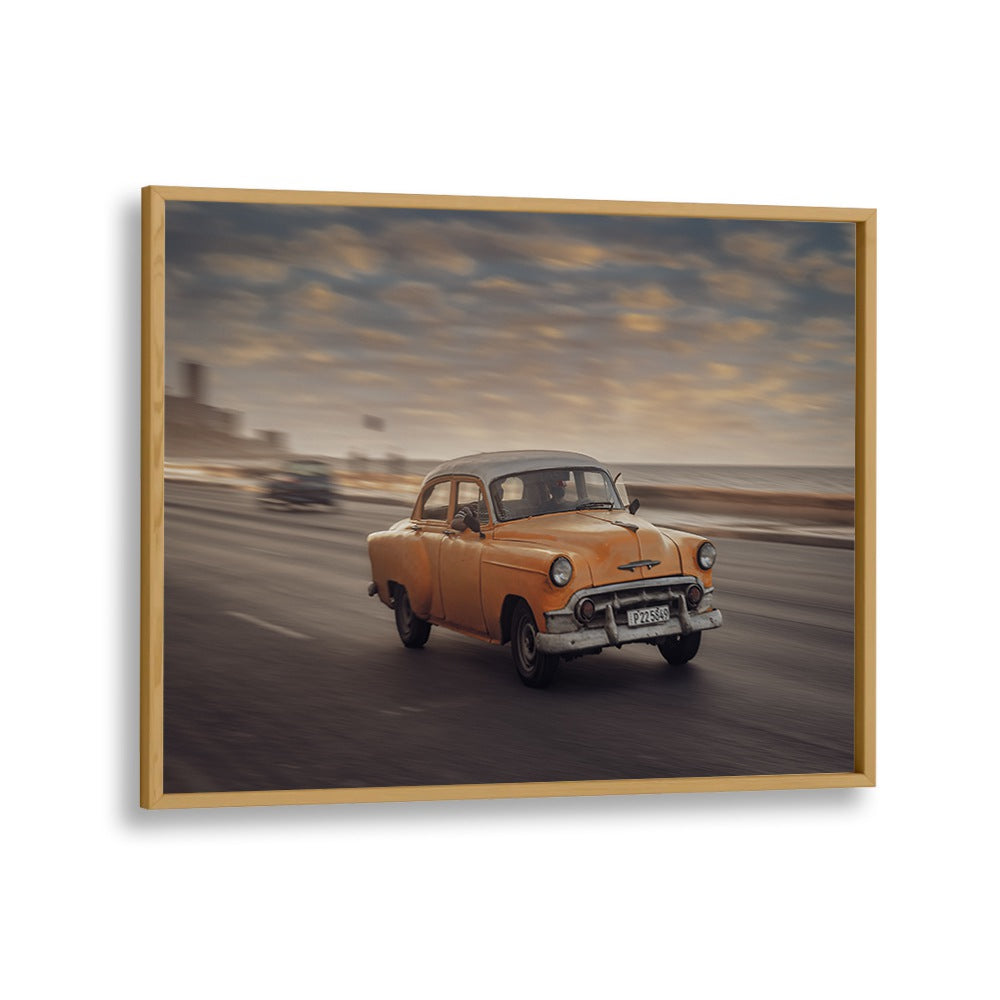 Capture the essence of street life with MALECON VII, PHOTOGRAPHY PRINTS featuring a classic car in motion.