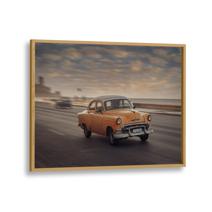 Capture the essence of street life with MALECON VII, PHOTOGRAPHY PRINTS featuring a classic car in motion.