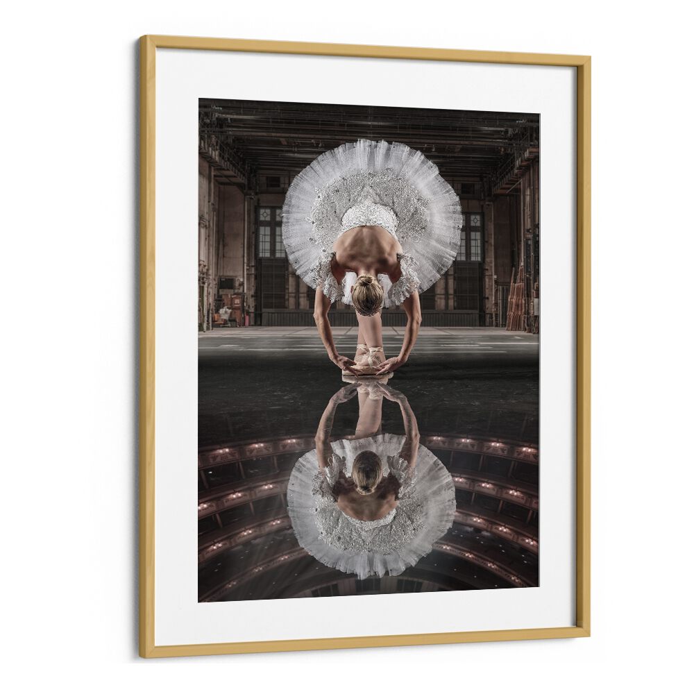 Elegant ballerina stretching on stage, showcasing BALLERINA STAGE, PHOTOGRAPHY PRINTS for surreal home decor.