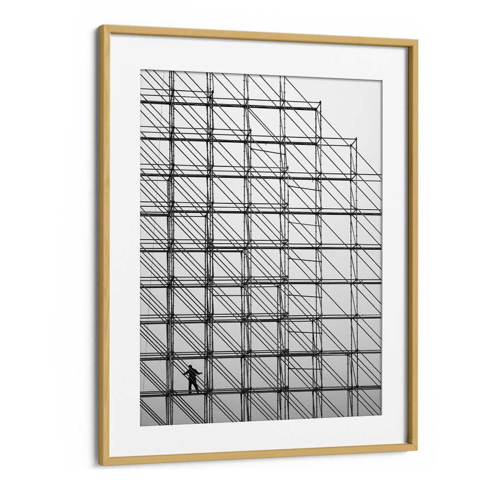 Black and white CUBE photography prints showcasing a worker on scaffolding, perfect for fine art enthusiasts.