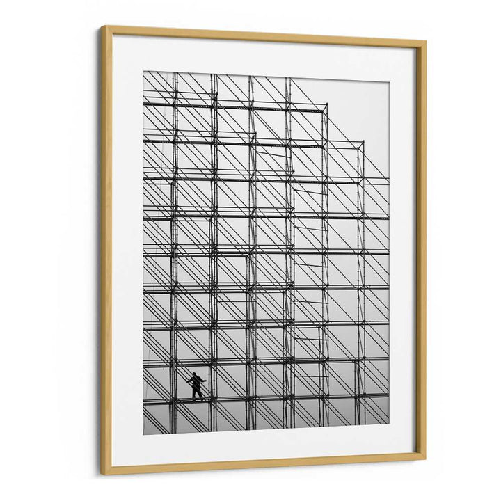 Black and white CUBE photography prints showcasing a worker on scaffolding, perfect for fine art enthusiasts.