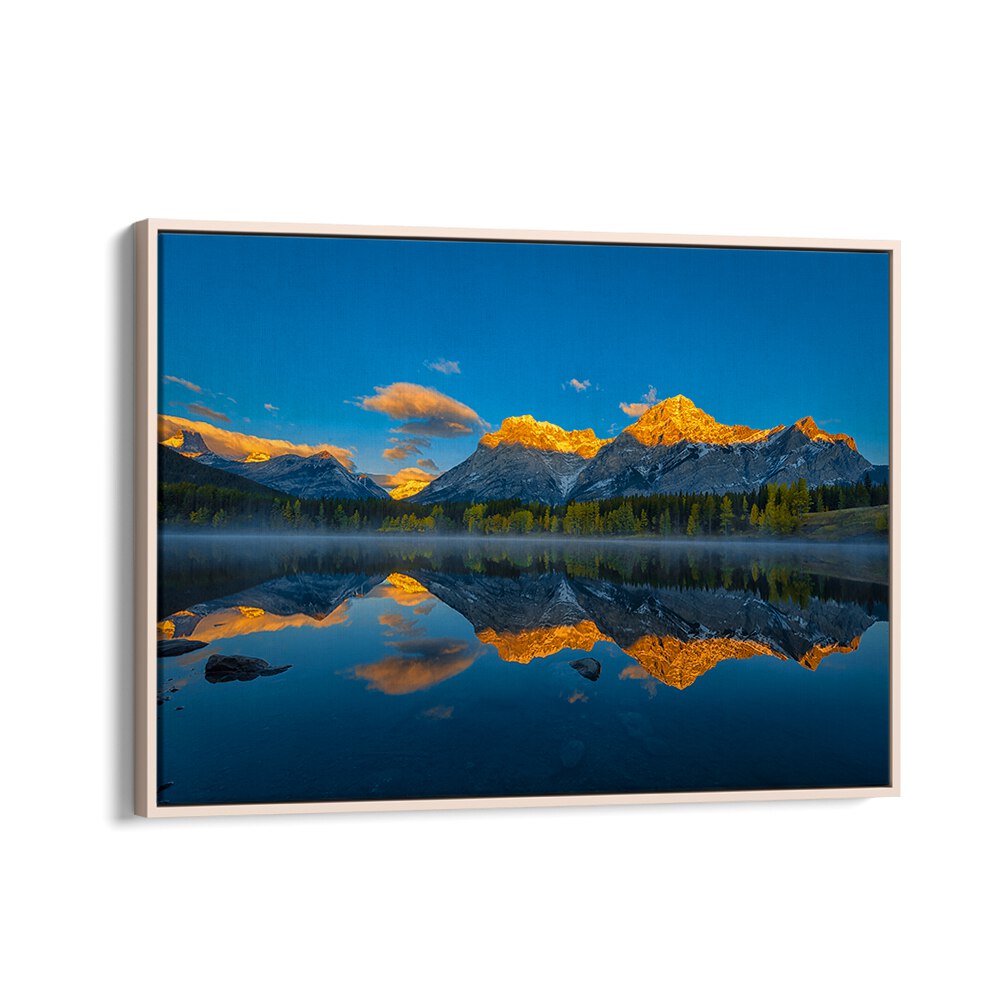 Breathtaking sunrise reflecting on calm waters in "A PERFECT MORNING IN CANADIAN ROCKIES, PHOTOGRAPHY PRINTS."