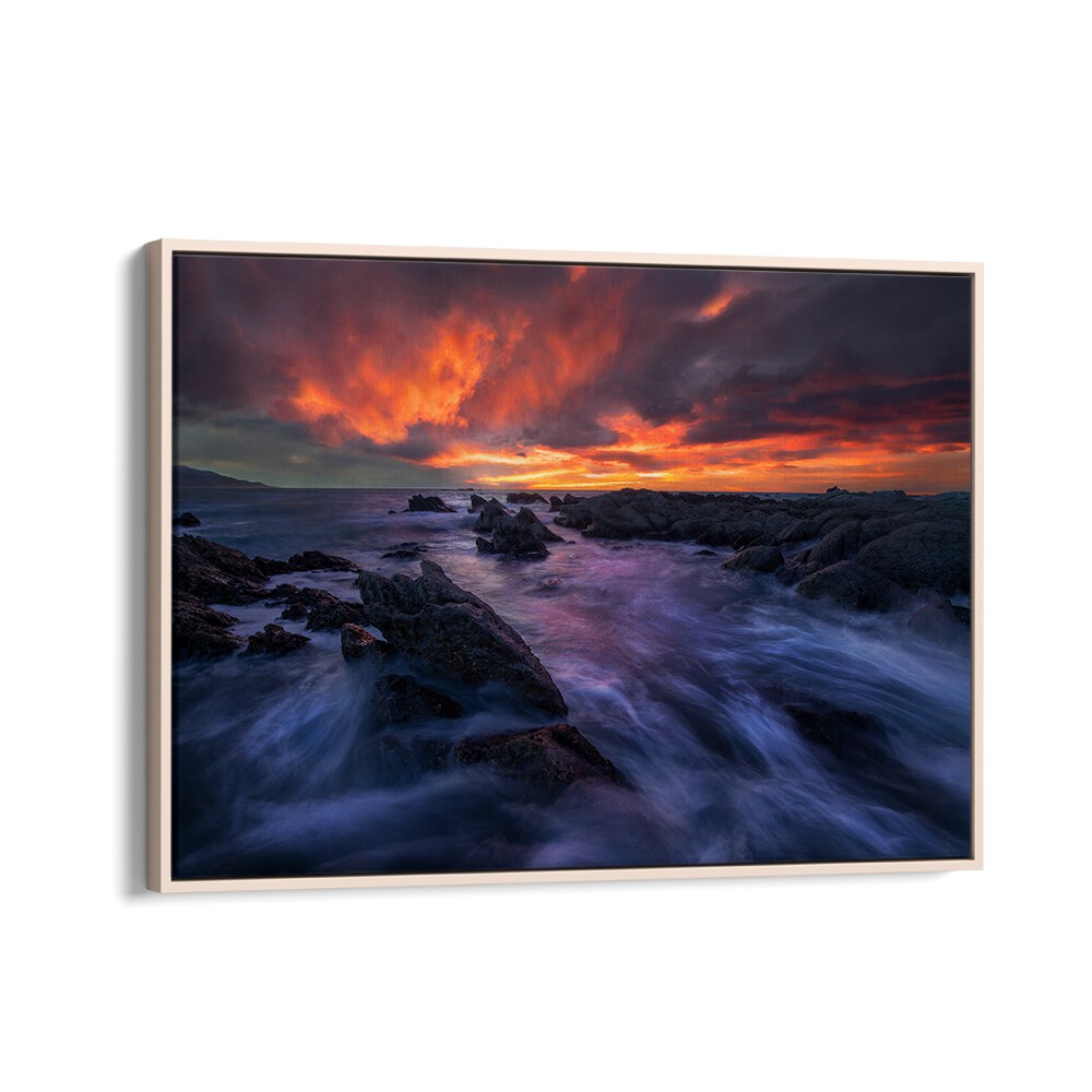Stunning BURNING SKY, PHOTOGRAPHY PRINTS showcasing vibrant sunset over rocky shoreline, perfect for nature lovers.