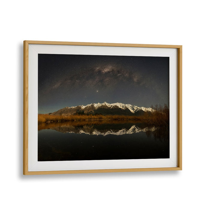 Stunning SNOW MOUNTAIN UNDER MOONLIGHT, PHOTOGRAPHY PRINTS showcasing moonlit snowy peaks reflected in calm waters.