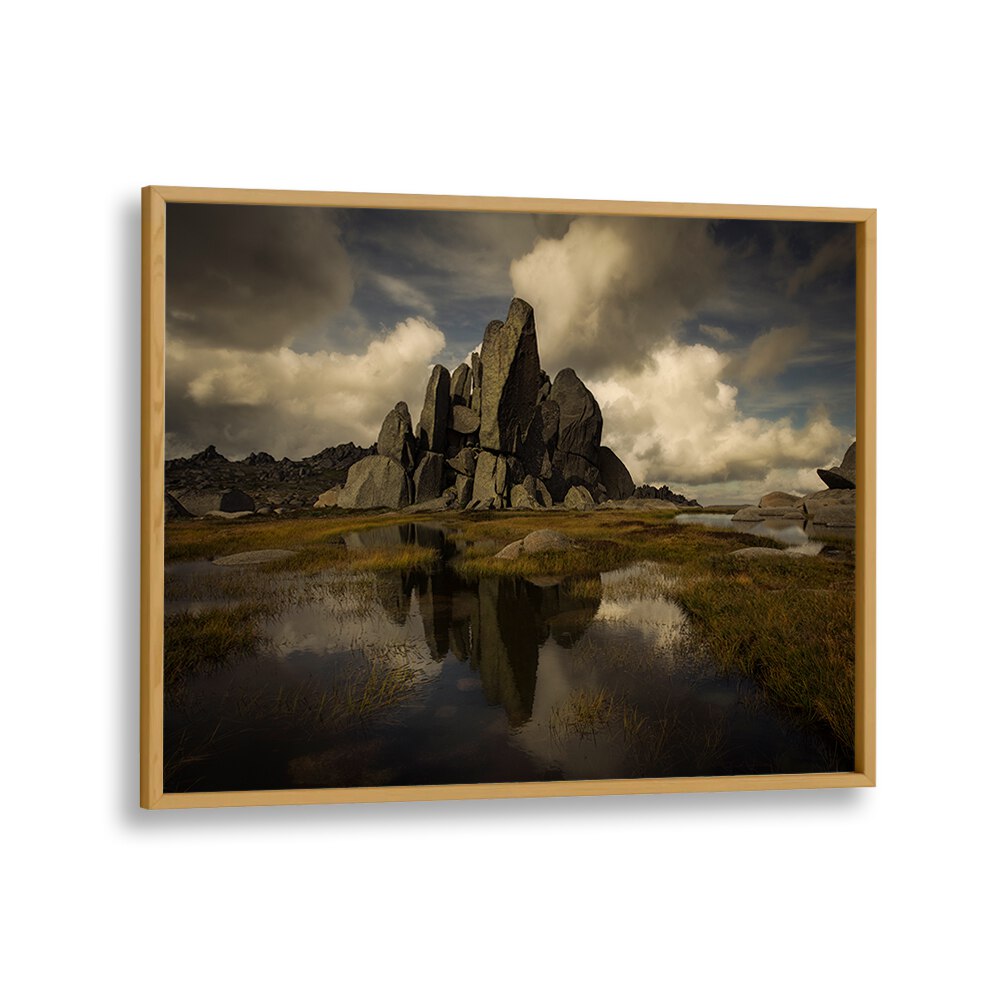 Stunning STANDING ALONE, PHOTOGRAPHY PRINTS showcasing dramatic rocks reflected in serene waters and moody skies.