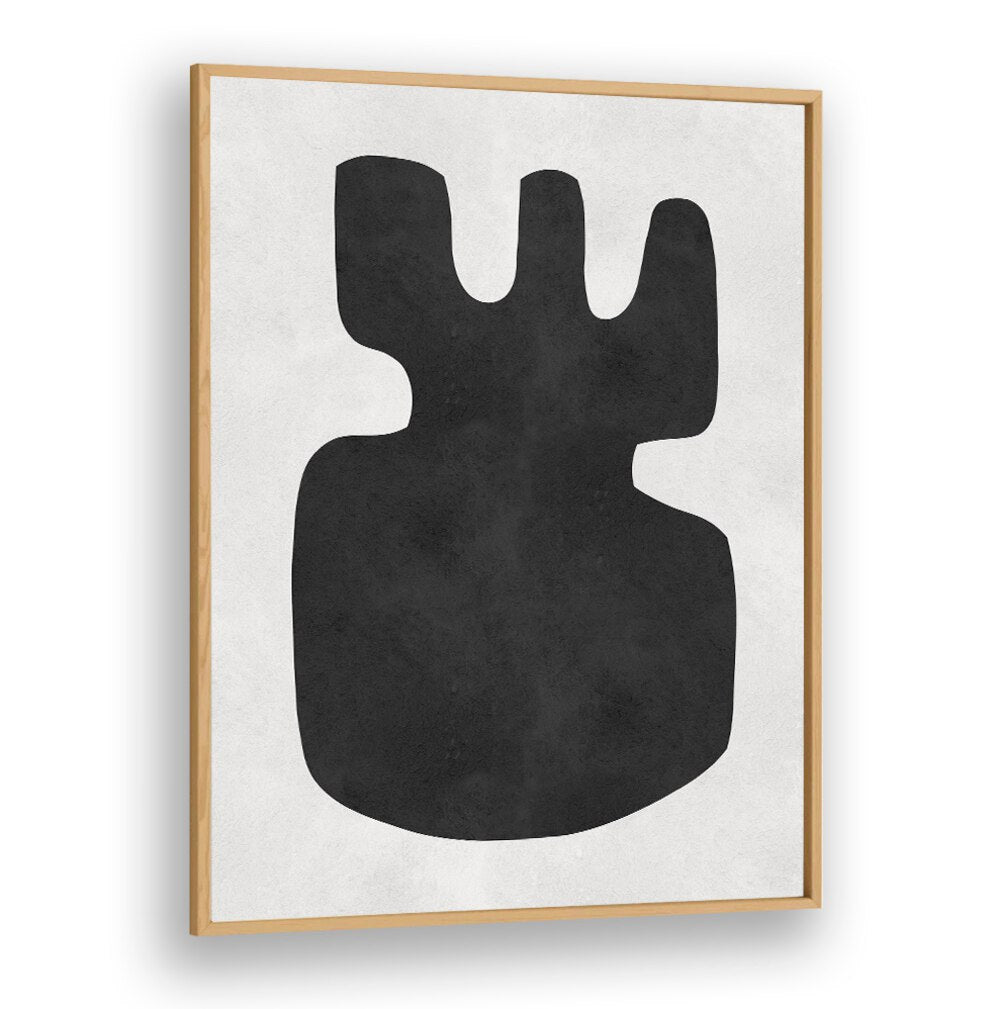 Bold black shape on a light backdrop, showcasing ORGANIC, GEOMETRIC ART PRINTS for modern decor enthusiasts.