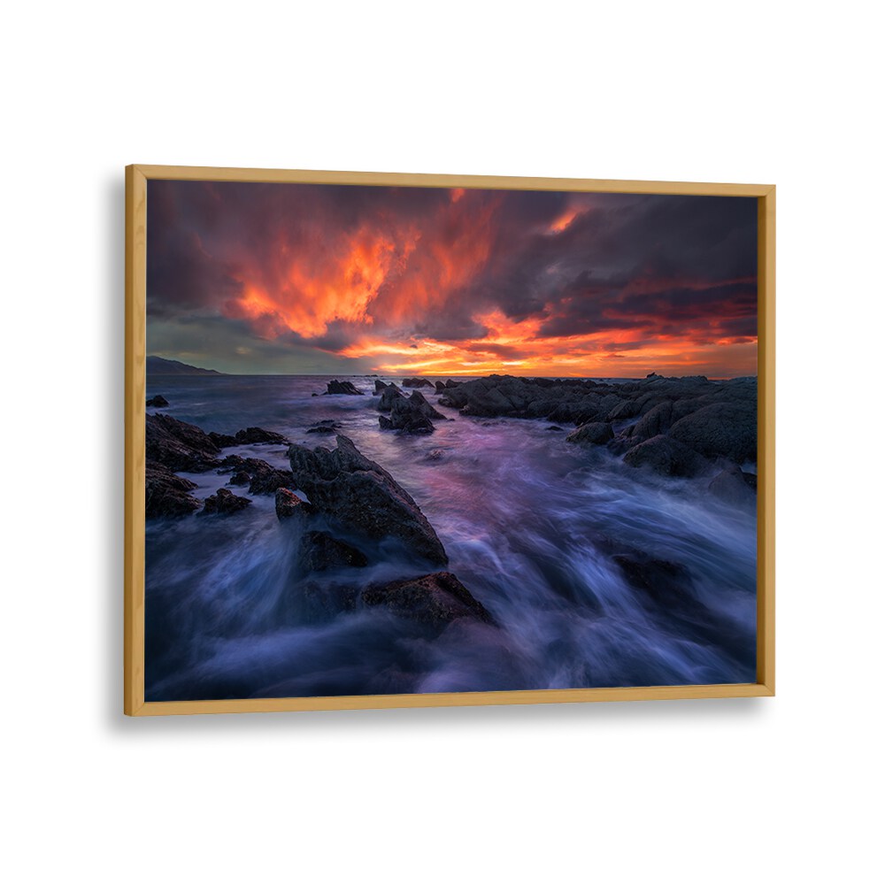 Stunning BURNING SKY, PHOTOGRAPHY PRINTS featuring vibrant sunset over rocky coast, perfect for nature lovers.