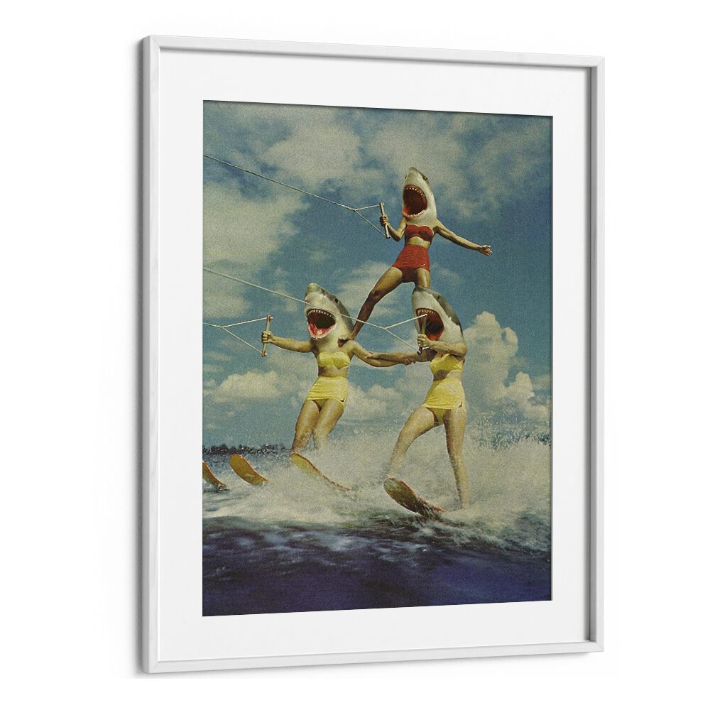 Three women with shark heads water skiing in a surreal scene, featured in ON EVIL BEACH - SHARK ATTACK, SURREAL ART PRINTS.