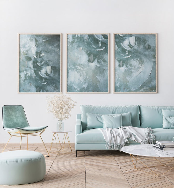 Transform your space with the OCEAN WHISPER SET, SET OF 3 PAINTINGS, showcasing serene coastal hues and textures.