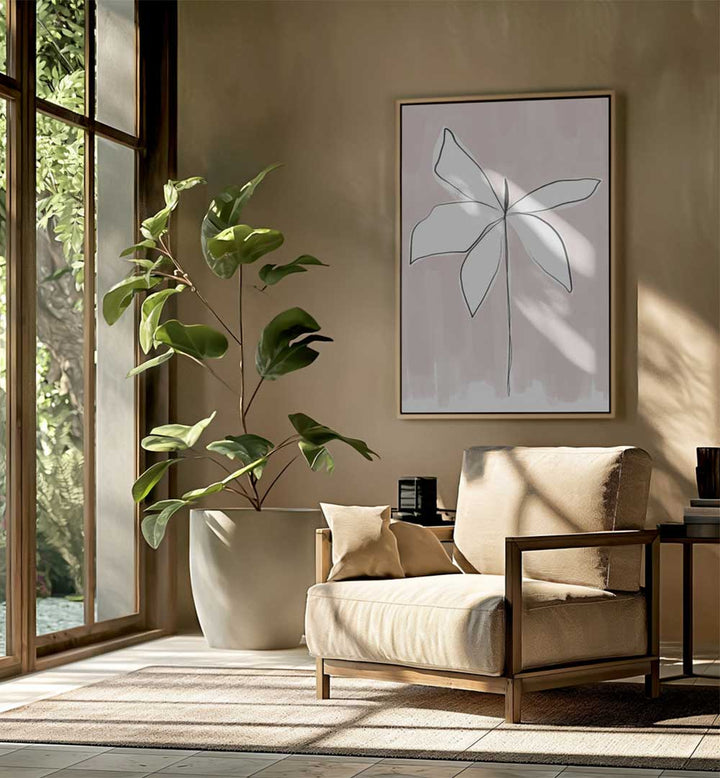 Sunlit living room with potted plant, armchair and framed PETAL WHISPERS , FLORAL FLOWER PAINTINGS on wall