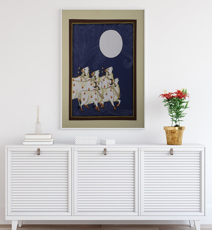 PICHWAI PAINTINGS III, INDIAN ART PAINTINGS feature five serene cows under a full moon, capturing traditional Indian artistry.