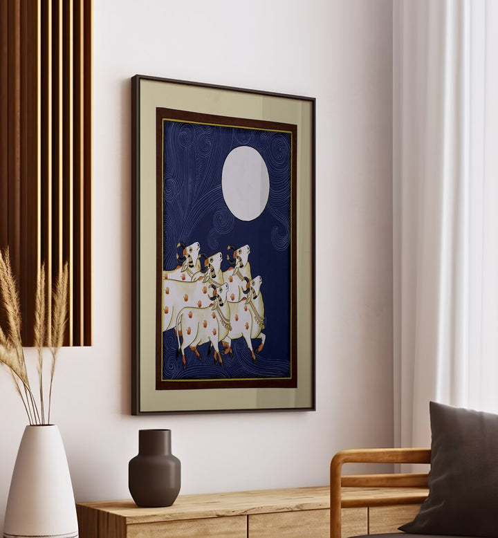 PICHWAI PAINTINGS III, INDIAN ART PAINTINGS feature serene cows under a glowing moon, enhancing your space's charm.