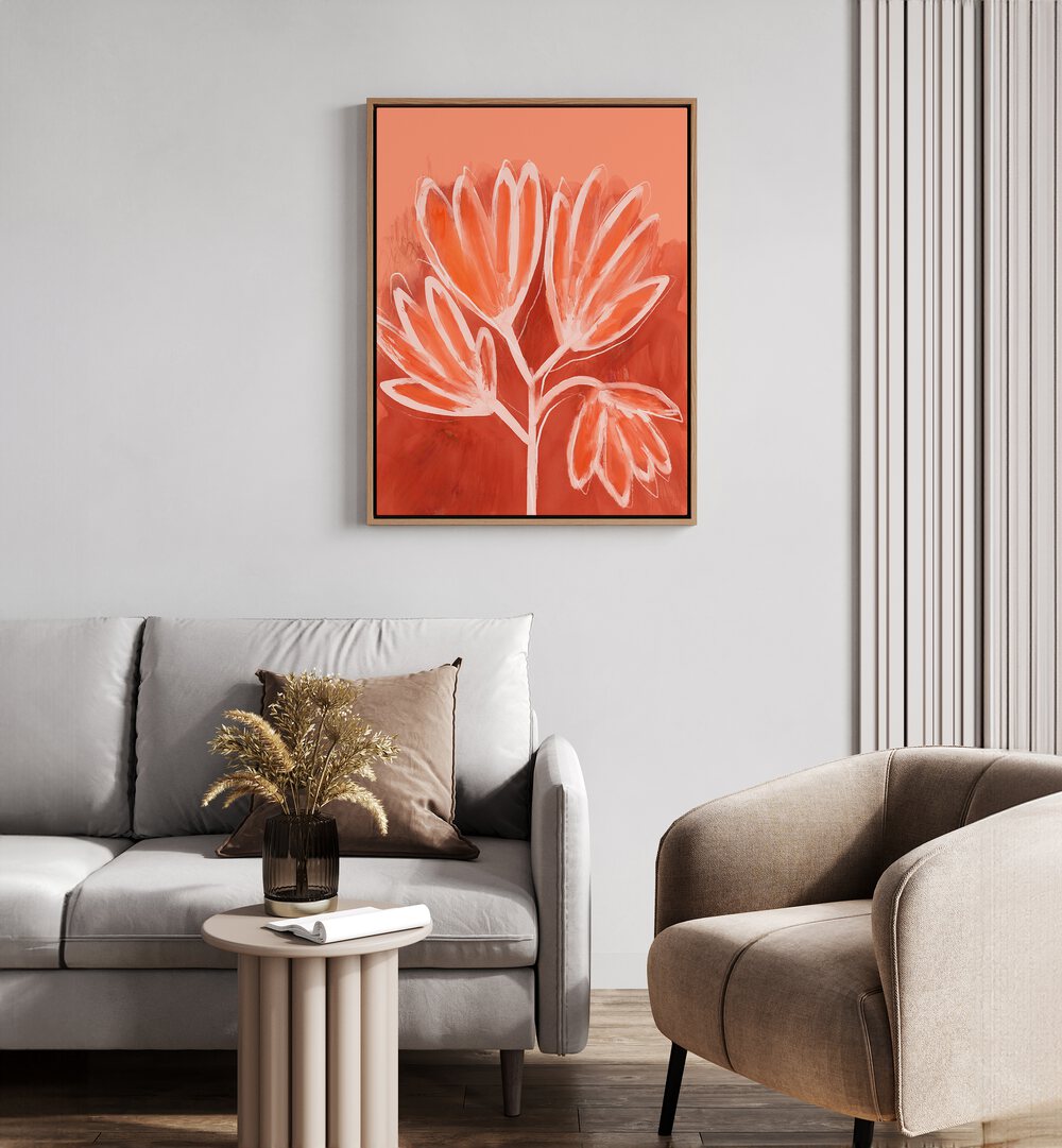 Peachy Flowers by Treechild Botanical Flower Paintings Floral Paintings in Oak Wood Floater Frame placed on a living room wall behind a sofa