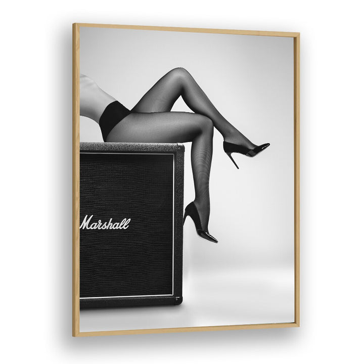 Stylish legs in fishnet stockings pose beside a Marshall amp in ROCK N LEGS, PHOTOGRAPHY PRINTS by David Drake.