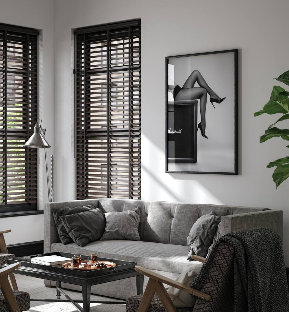 Stylish living room featuring "ROCK N LEGS, PHOTOGRAPHY PRINTS" by David Drake, blending fashion and fine art.