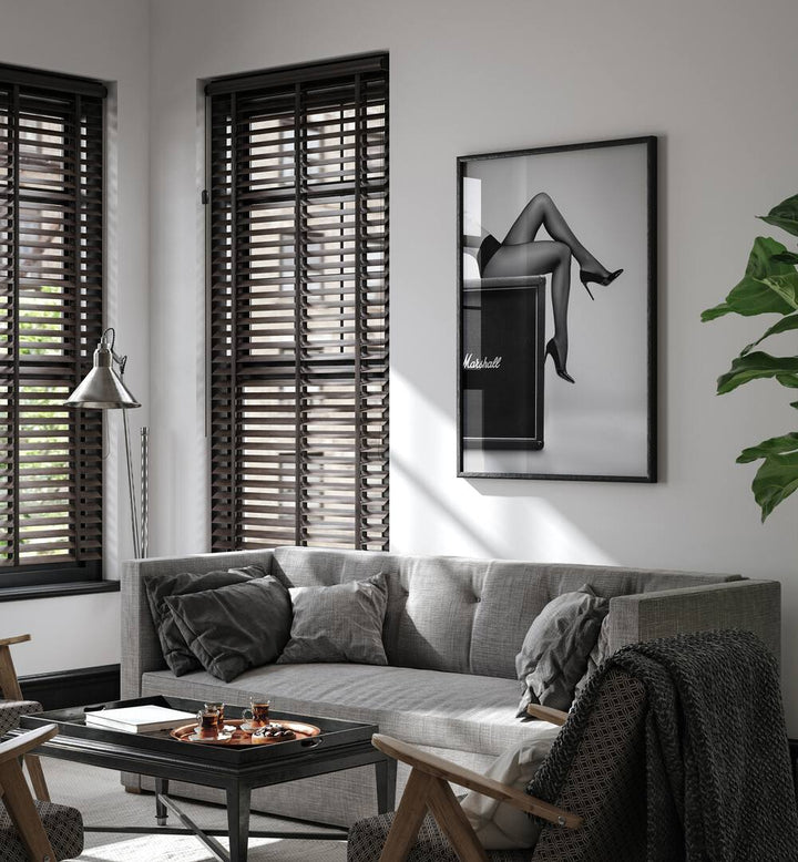 Stylish living room featuring "ROCK N LEGS, PHOTOGRAPHY PRINTS" by David Drake, blending fashion and fine art.