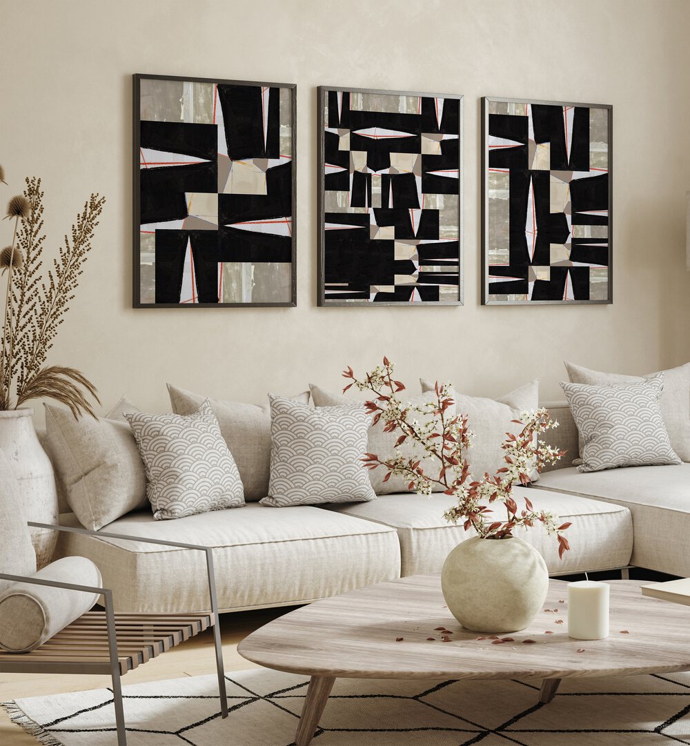 Stylish living room featuring the BLACK JIGSAW SET, SET OF 3 PAINTINGS, enhancing modern aesthetics beautifully.