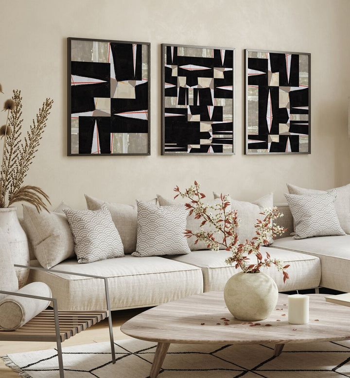 Stylish living room featuring the BLACK JIGSAW SET, SET OF 3 PAINTINGS, enhancing modern aesthetics beautifully.