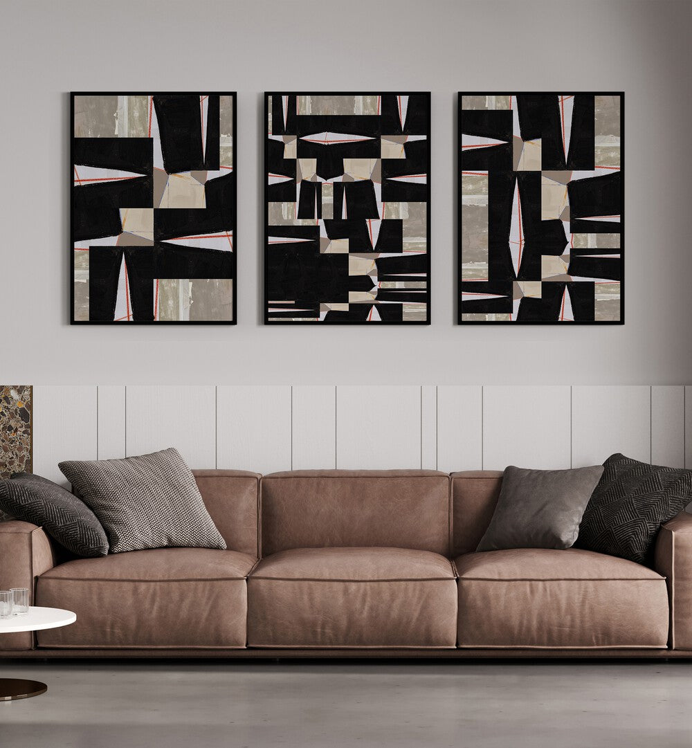 Stylishly arranged BLACK JIGSAW SET, SET OF 3 PAINTINGS enhancing modern living spaces with artistic flair.