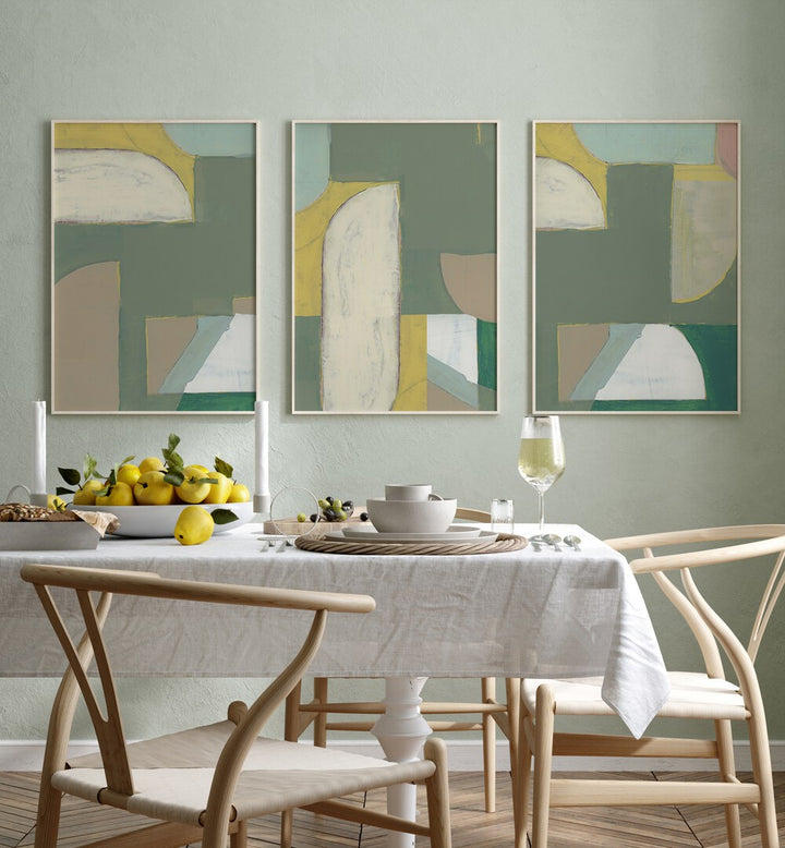 Elegant OLIVE GREEN ABSTRACT SET, SET OF 3 PAINTINGS enhancing a stylish dining space with modern art.