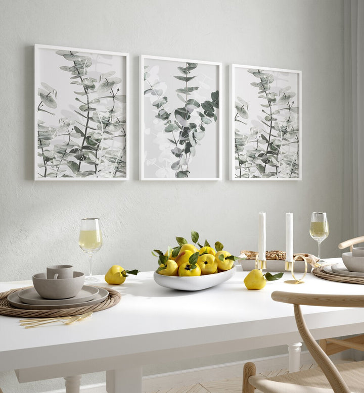 Elegant dining area showcasing the TRANQUIL EUCALYPTUS SET, SET OF 3 PAINTINGS, enhancing natural serenity in your home.