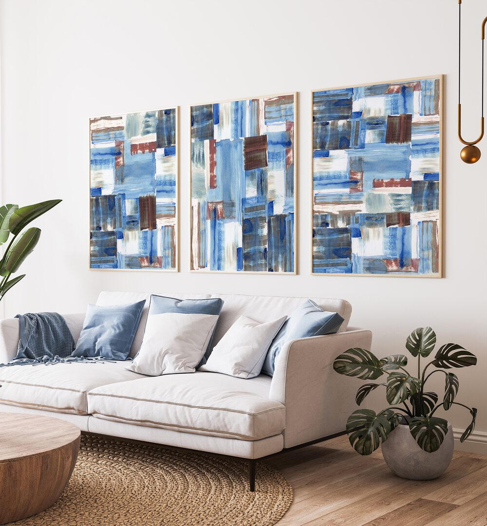 Transform your space with the ICY BLUE ABSTRACT SET, SET OF 3 PAINTINGS featuring soothing icy blue tones.