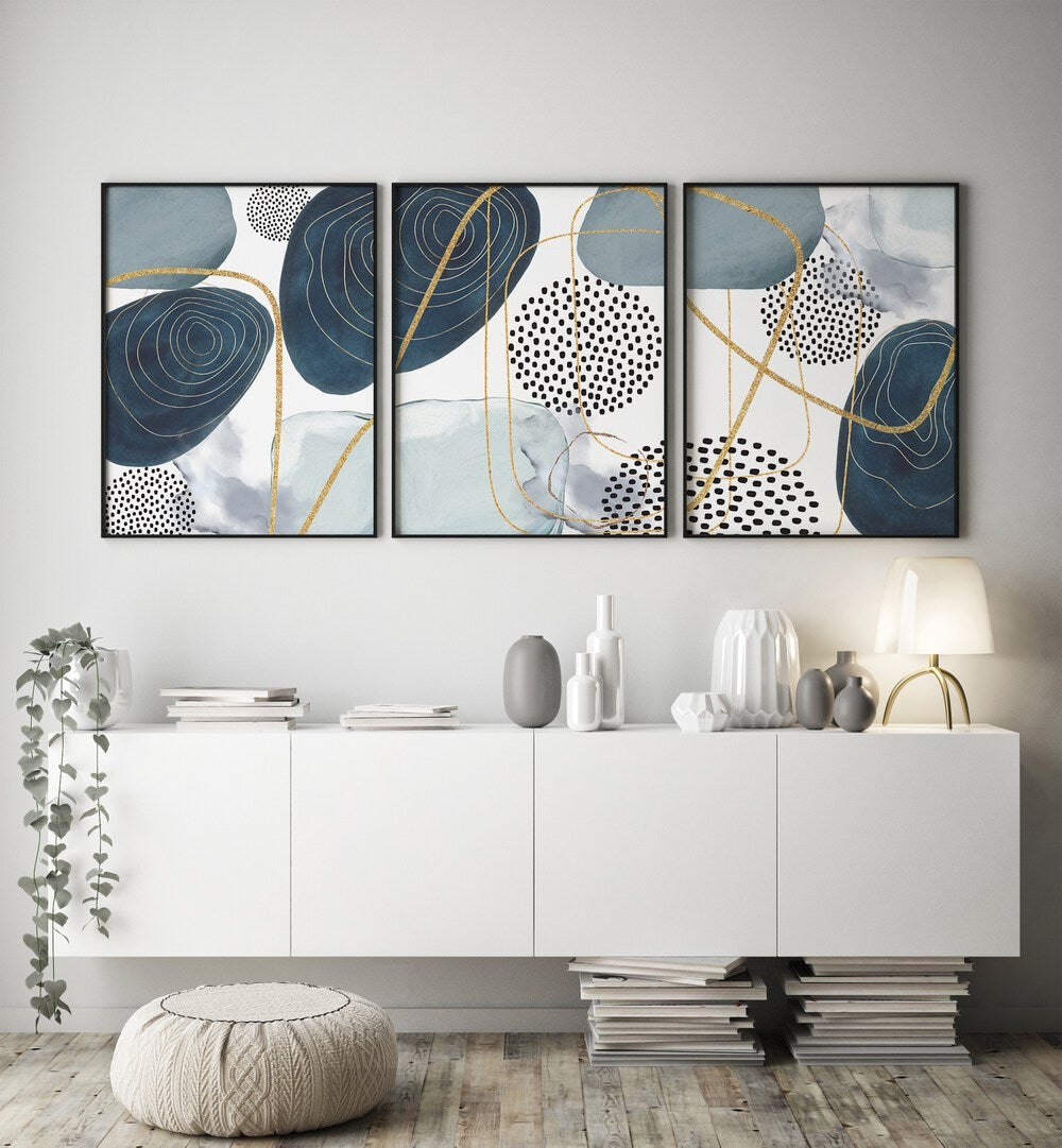Transform your space with the SHAPELY BLUES SET, SET OF 3 PAINTINGS, featuring abstract blue art for serenity.