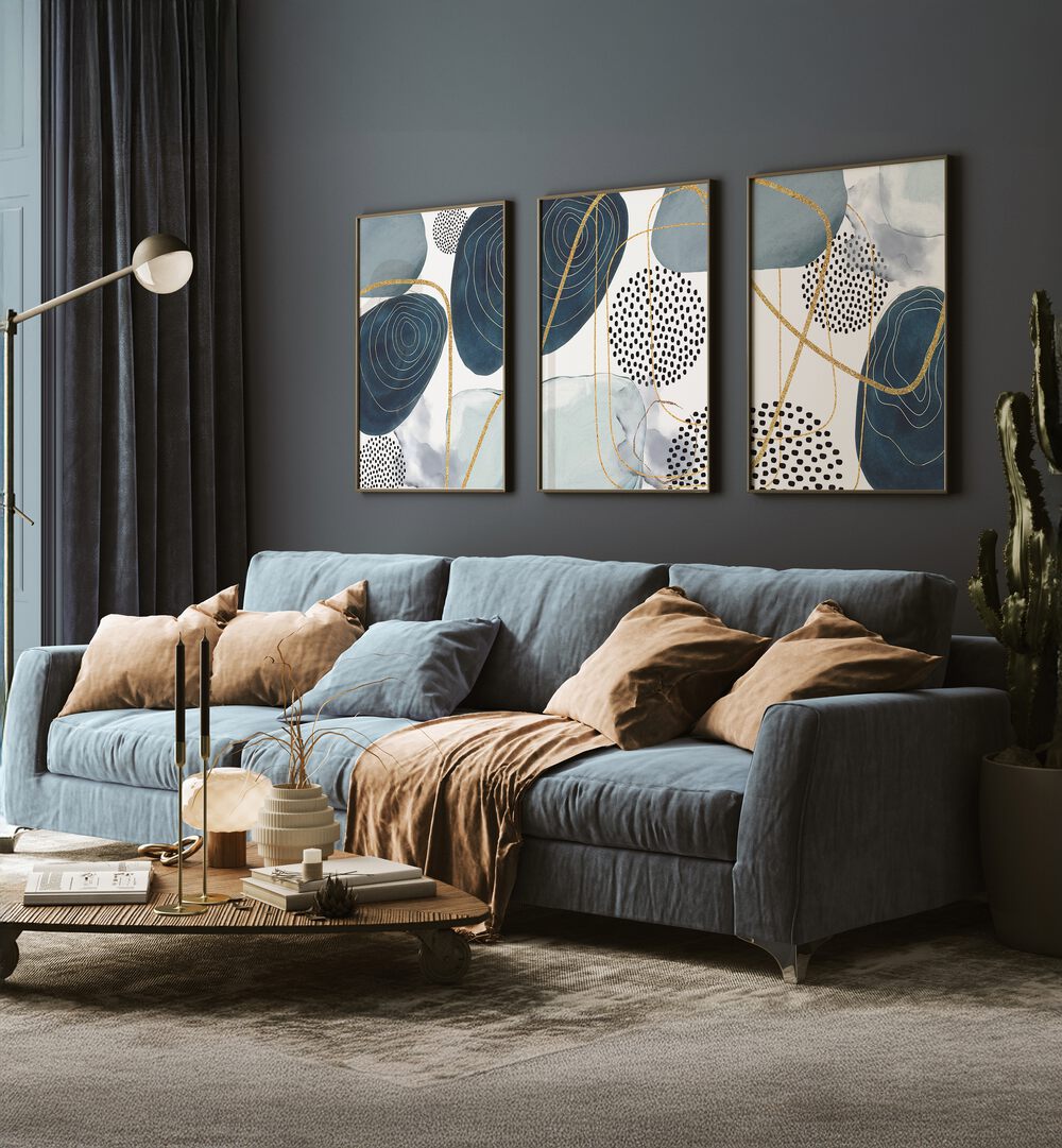 Enhance your decor with the SHAPELY BLUES SET, SET OF 3 PAINTINGS, featuring elegant blue abstract designs.