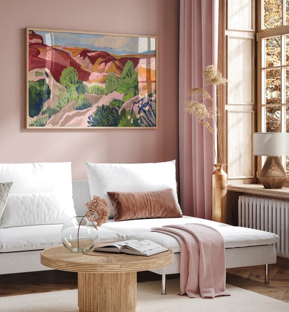 Vibrant SOUTH WESTERN SKY, LANDSCAPE PAINTINGS enhance this cozy living room with stunning southwestern scenery.