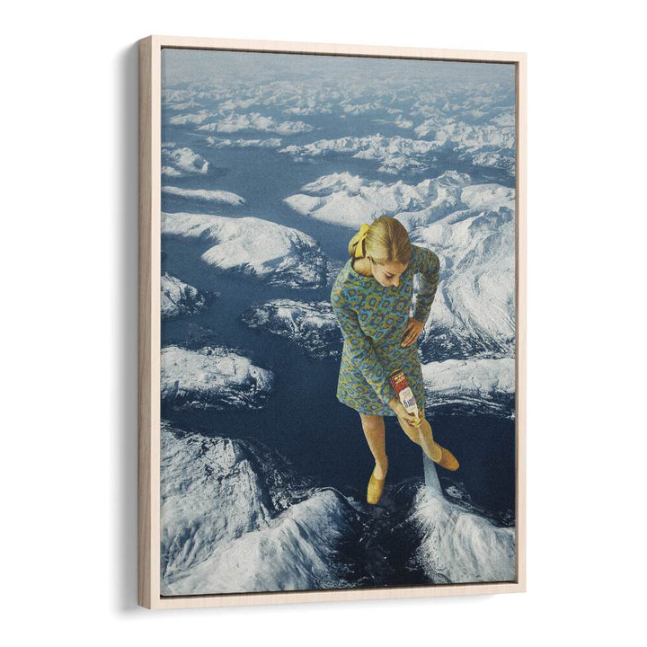 Surreal art print "Spraying Snow" showcases a woman in a vibrant dress over snowy mountains, perfect for any space.