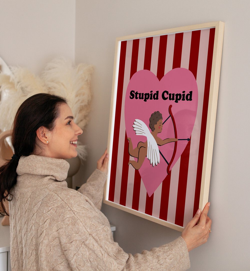 Whimsical STUPID CUPID, QUOTES poster elevating your space with humor and charm, perfect for any room decor.